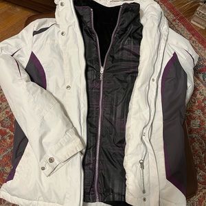 Used woman medium snowboard Jacket. In good condition with minor scuffs.